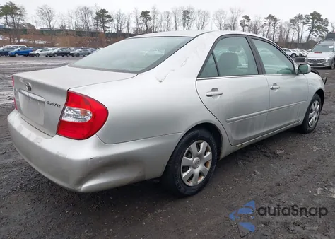 2003 Toyota Camry Le z USA, uszkodzony, nr VIN 4T1BE32K73U140341